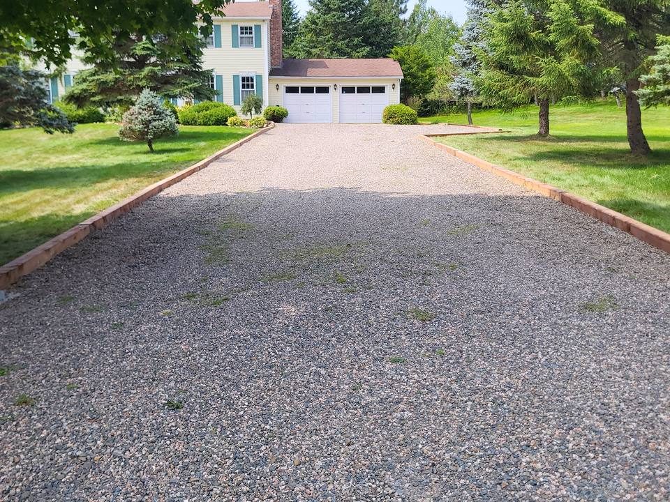 New gravel driveway with timber edging